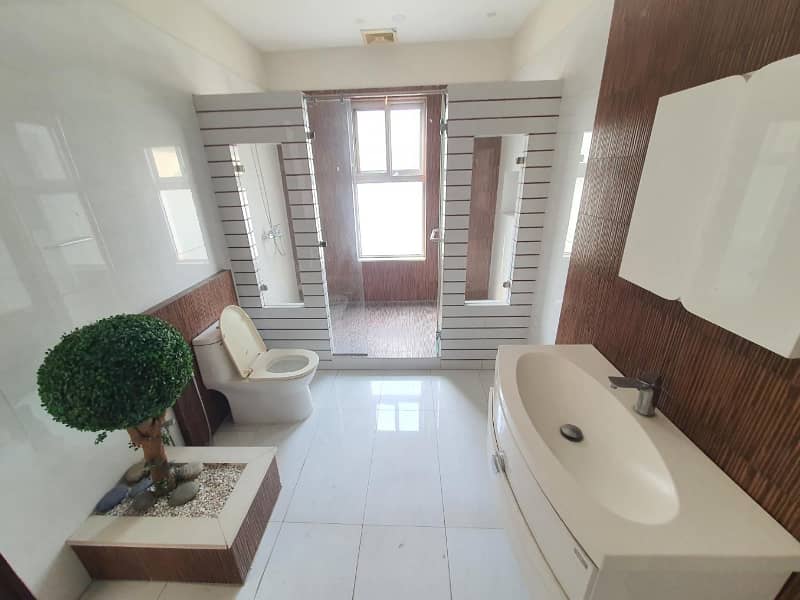 Well Maintained One Kanal Designer Bungalow Available For Rent Near Main Road Hot Location 22