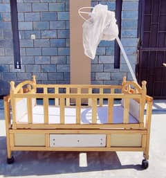 Baby cot with swing