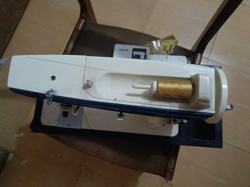 sewing machine by singer 1