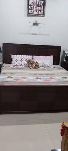 wooden double bed