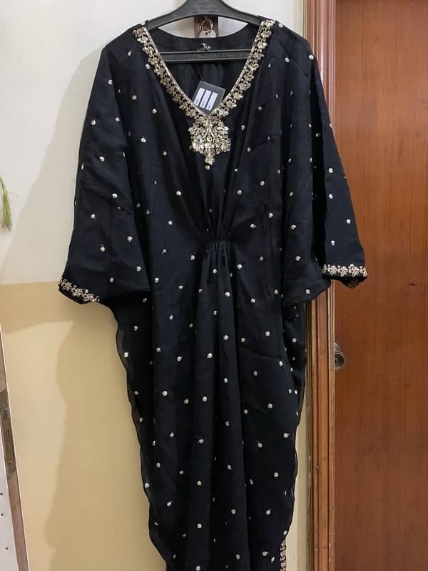 black kaftan by “Agha jaan” 0