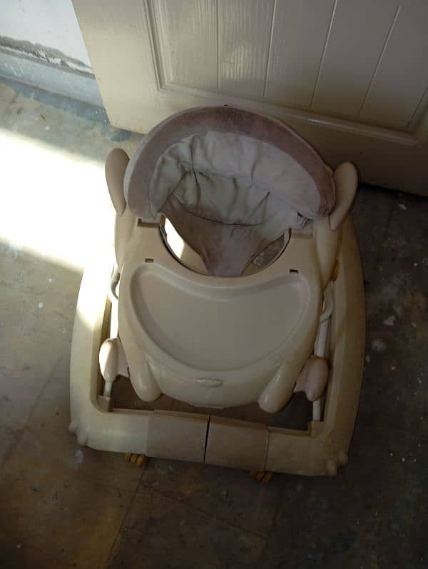 set of baby walker, carry cot and pram for sale 1