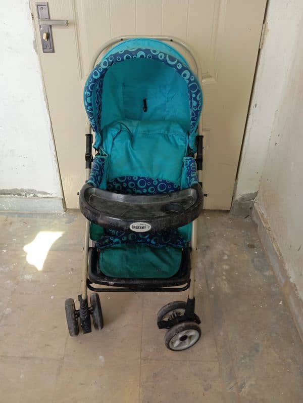 set of baby walker, carry cot and pram for sale 3