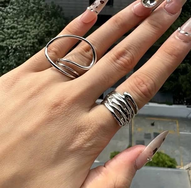 A Set Of Two Multi-layered, Heavy, Twisted Women's Rings For Fashio 1