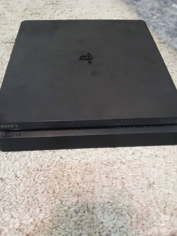 PS4 with 3 games and 2 controllers and 2 cables. 0