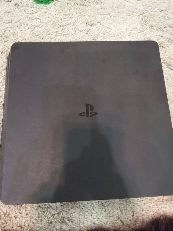 PS4 with 3 games and 2 controllers and 2 cables. 1