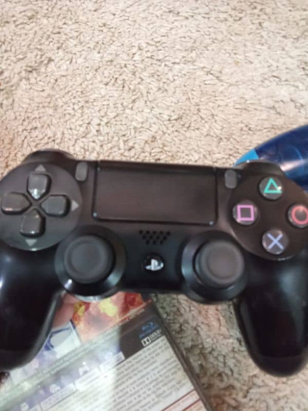 PS4 with 3 games and 2 controllers and 2 cables. 16