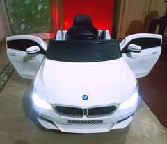 Kids BMW car with remotecontrol & swing rocking mode/doors opening