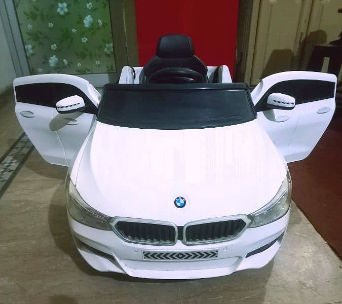 Kids BMW car with remotecontrol & swing rocking mode/doors opening 2