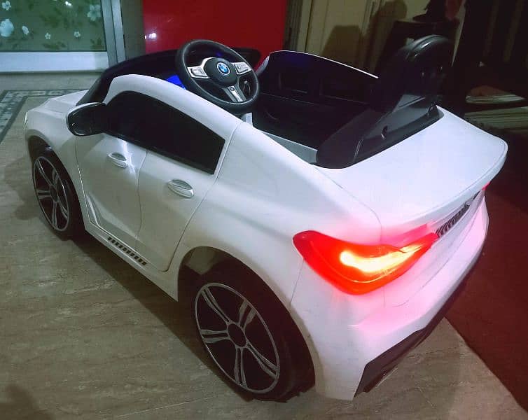 Kids BMW car with remotecontrol & swing rocking mode/doors opening 6