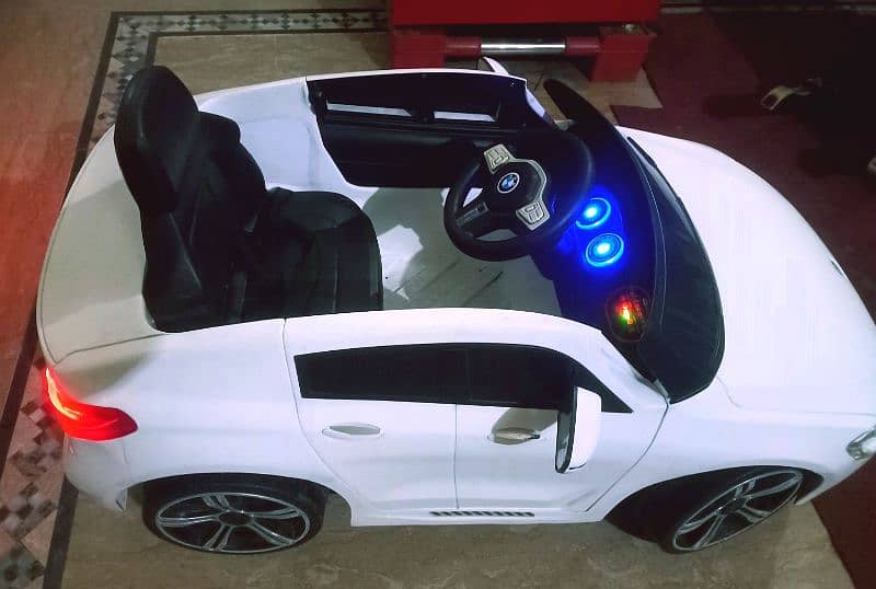 Kids BMW car with remotecontrol & swing rocking mode/doors opening 7