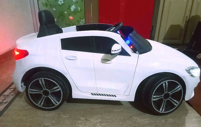 Kids BMW car with remotecontrol & swing rocking mode/doors opening 8