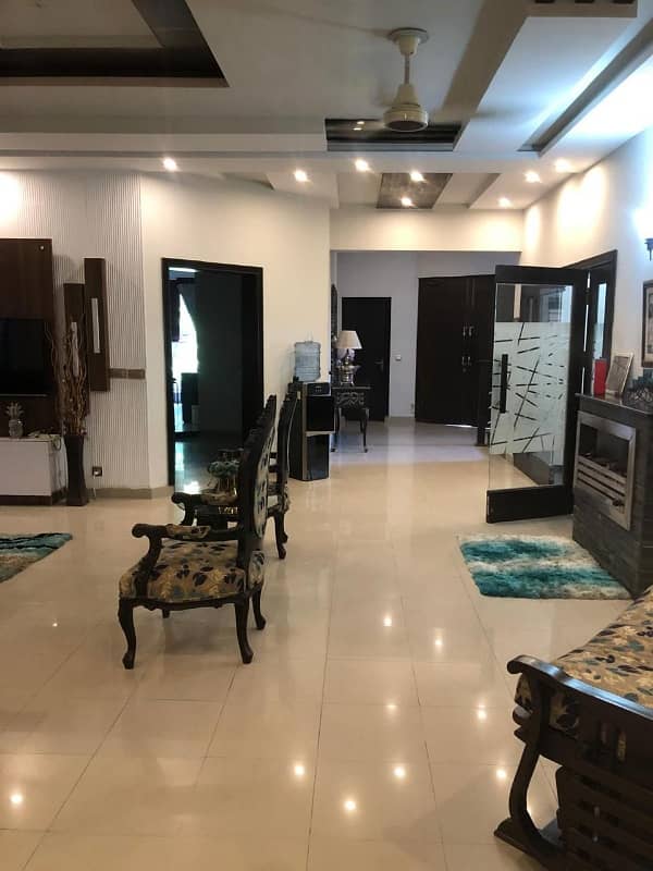 Kanal tile floor 6bed double story house is for sale in Wapda town 0