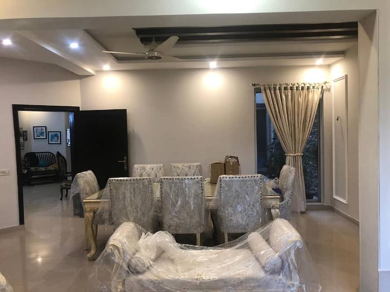 Kanal tile floor 6bed double story house is for sale in Wapda town 3