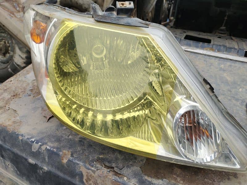 HID headlight city 2003 to 2005 1