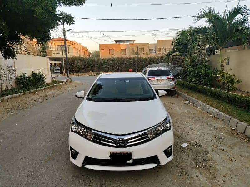 TOYOTA ALTIS GRANDE MODEL 2015 ORIGINAL WHITE COLOR ONLY (63000) KMS. 1