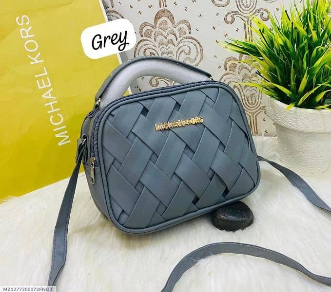 •  Material: PU Leather  Handbags 0