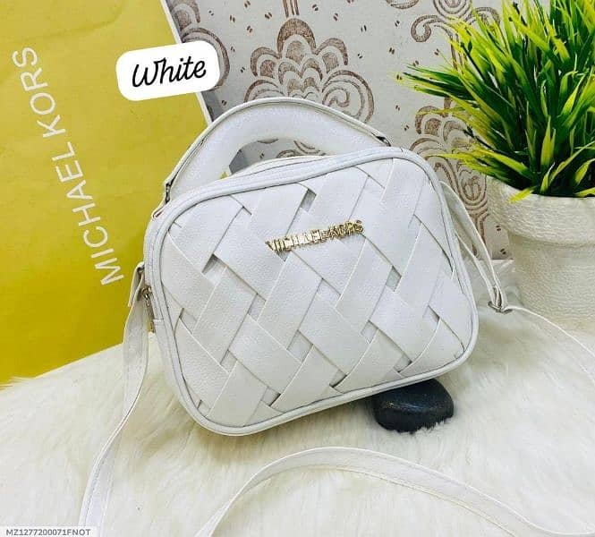 •  Material: PU Leather  Handbags 1