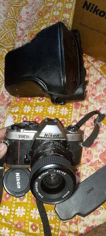 nikon fM 10 with 35- 70mm f/3.5-4.8 lens case 03703023880 3