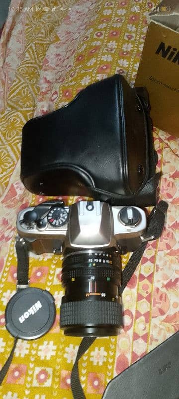 nikon fM 10 with 35- 70mm f/3.5-4.8 lens case 03703023880 4