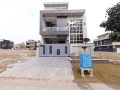 I am Direct Owner of House ( 5 Marla Double Unit Brand New House Available. For Sale in Faisal Town F-18 Islamabad