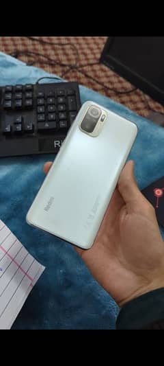 Redmi Note 10 in 10/10 condition with new battery and box