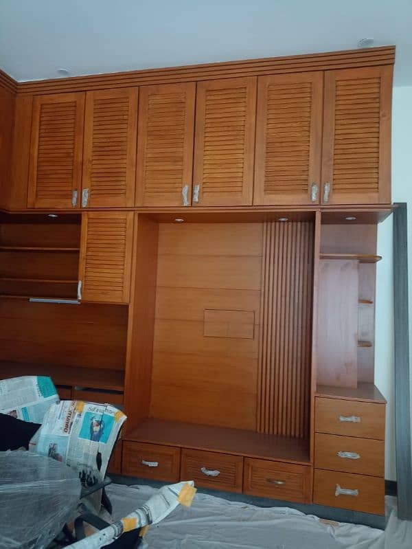 office and home wooden work,media wall,wood work,cabinets,Carpentery 13