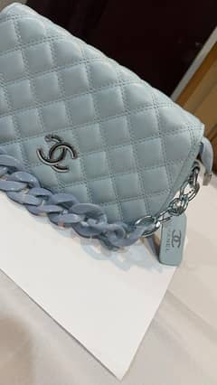 CHANEL leather crossbody bag with beautiful chain