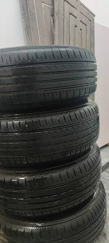 honda city brand new tyre 185 65 R15 + rims only 5000 km use 3