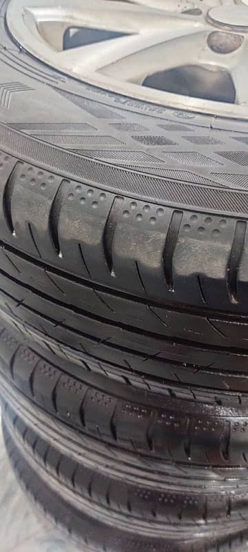 honda city brand new tyre 185 65 R15 + rims only 5000 km use 4