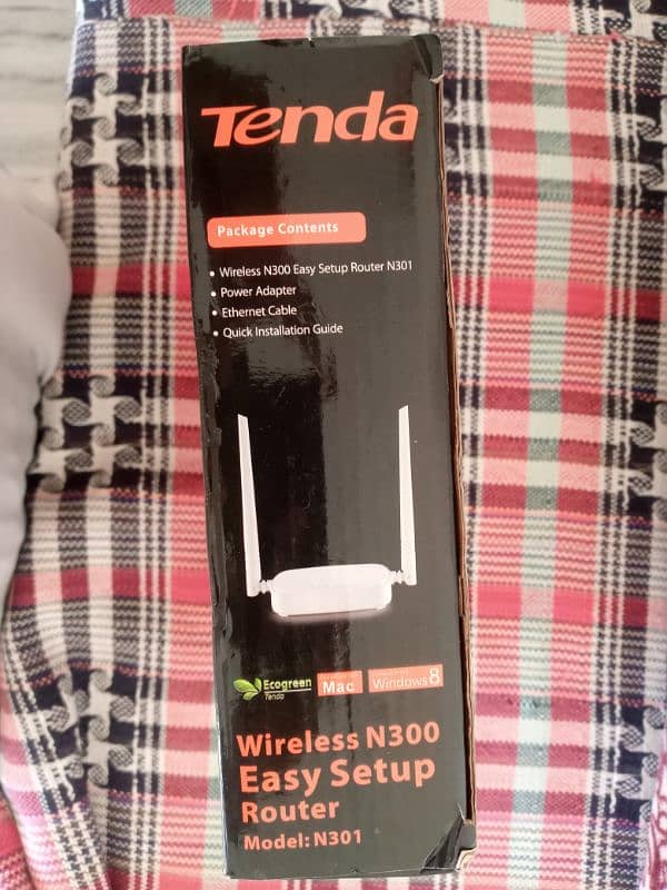 Tenda wifi router available for sale with box and cable and manual 1