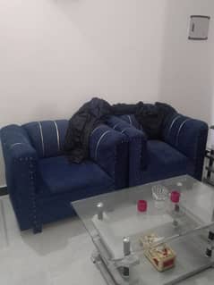 2 seater beautiful sofa in blue color urgent sale.