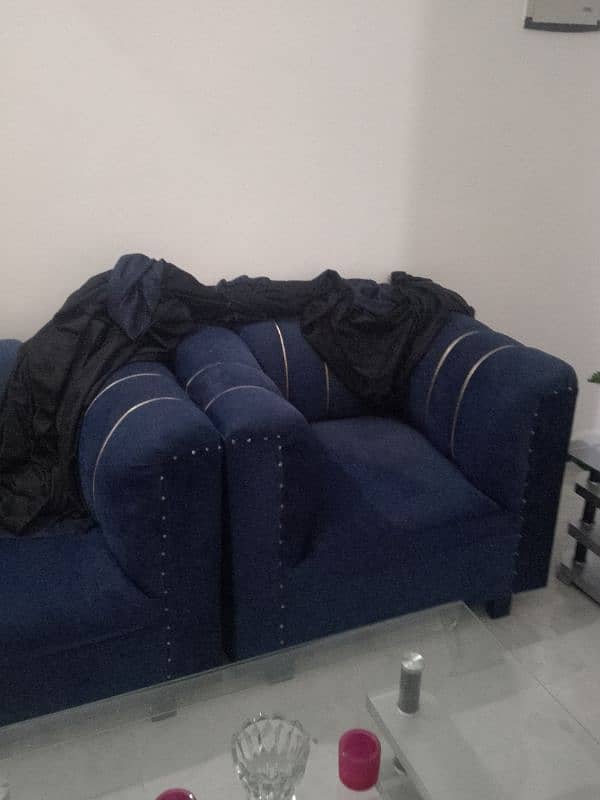 2 seater beautiful sofa in blue color urgent sale. 1