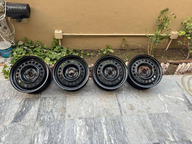 Honda city original rims with cup 15" 0