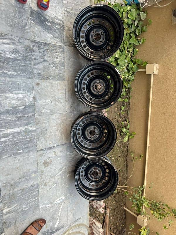 Honda city original rims with cup 15" 3