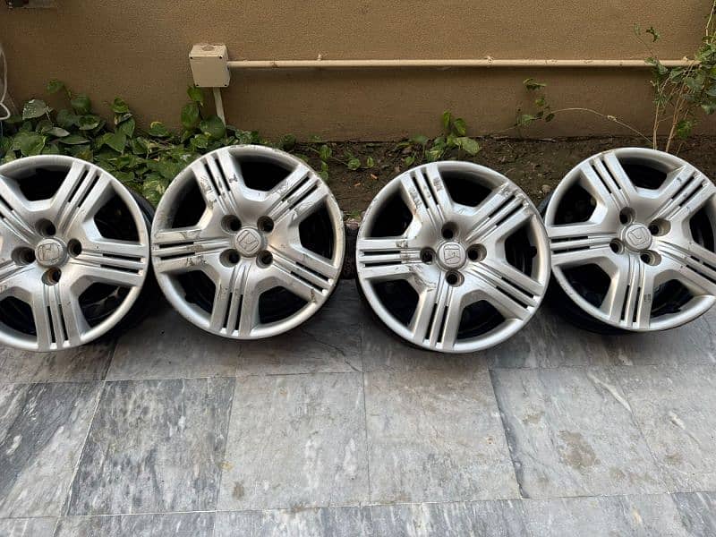 Honda city original rims with cup 15" 4