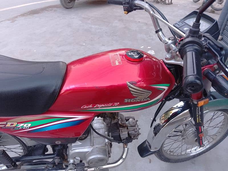 Honda cd 70 model 2015 6