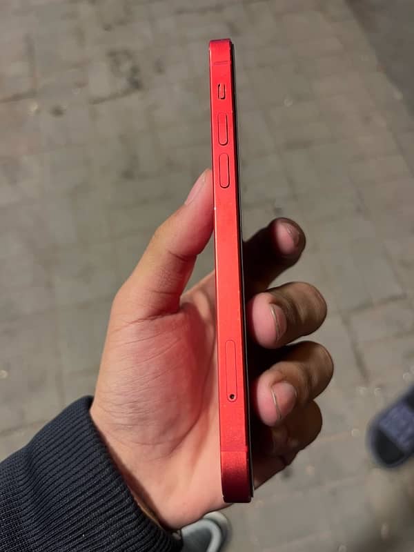 I phone  red colour 12 JV 64 gb sim time 4 month 10/9 1