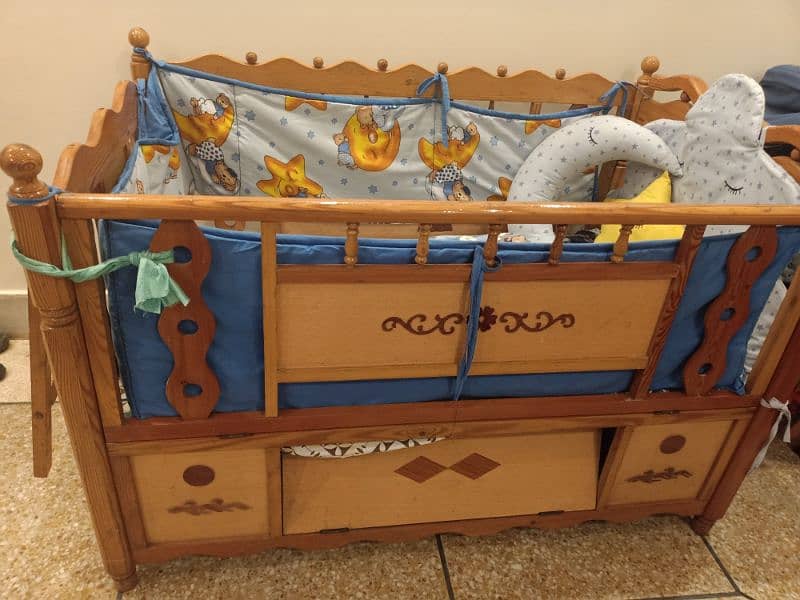 wooden cot with inner swing 0