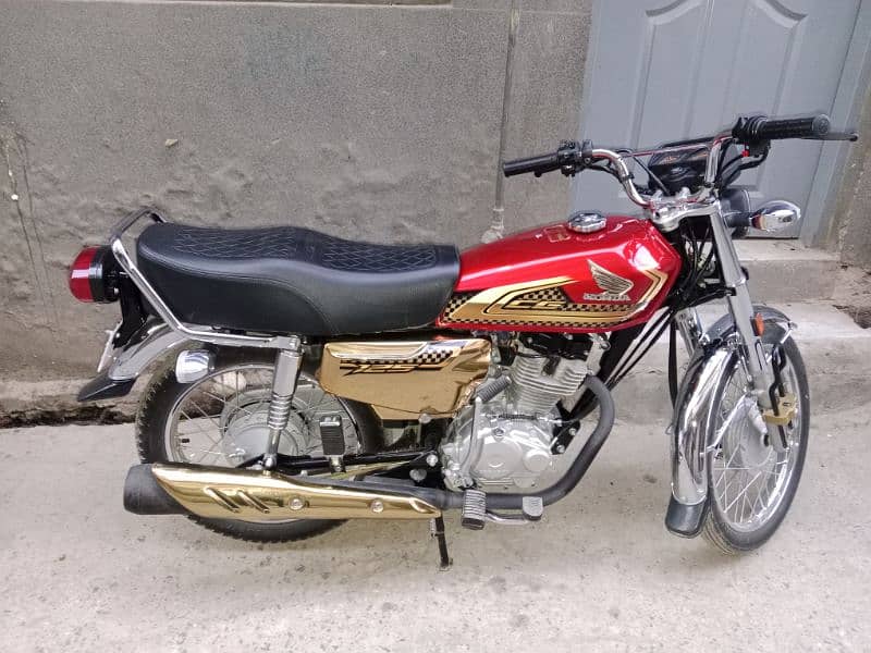 honda 125s gold edition with vip number 0