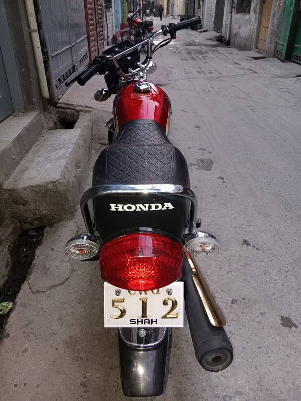 honda 125s gold edition with vip number 1