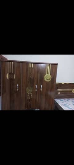 Wooden bed set is available in brand new condition .