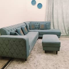 Lshaped sofa with ottoman