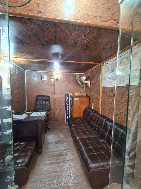 7 10 FEET SHOP FOR RENT ON MAIN BOULEVARD ALLAMA IQBAL TOWN 1