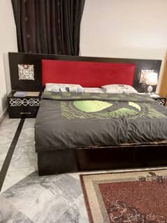 double bed with side table