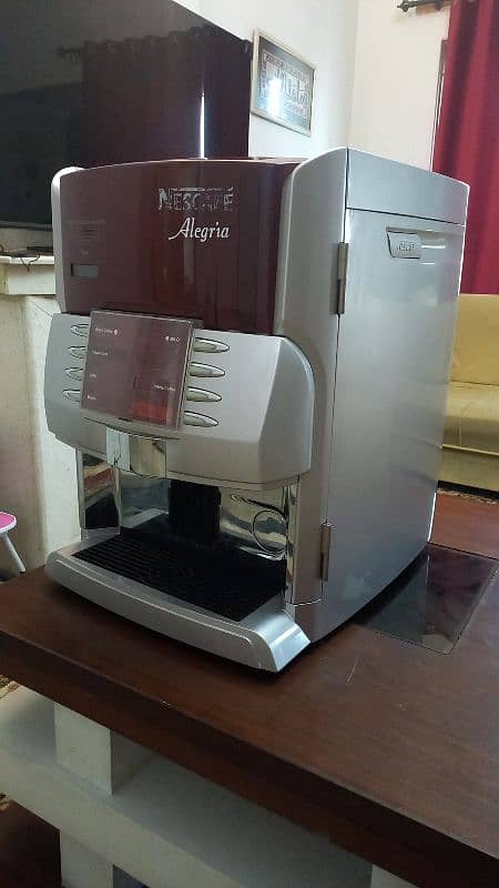 Nescafé coffee and tea machine. 1