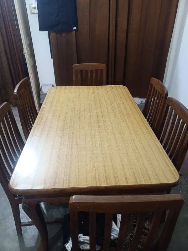 Wooden Dinning table with 6 chairs for sale 0