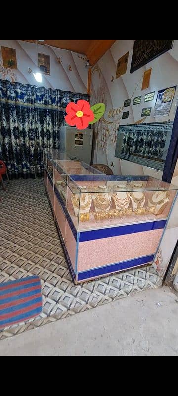 jewelry shop stoke for sale. chairs,counter,metal safe,wall grass,flow 1