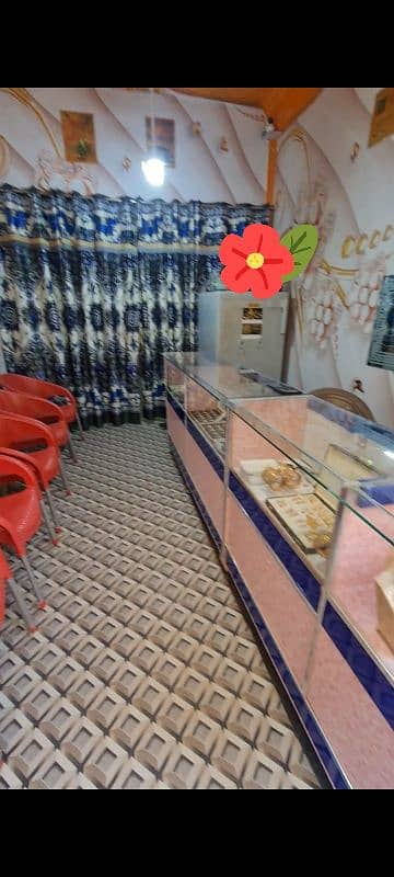 jewelry shop stoke for sale. chairs,counter,metal safe,wall grass,flow 3