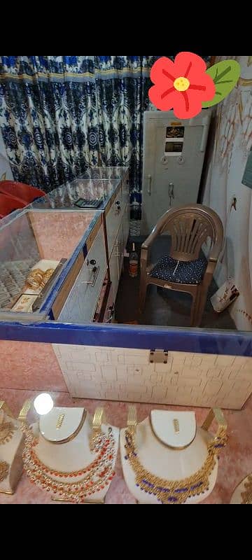 jewelry shop stoke for sale. chairs,counter,metal safe,wall grass,flow 5